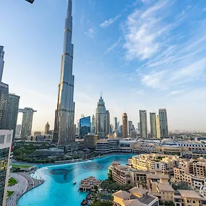 fam-living-the-residences-tower-burj-fountain-view.sharjah-hotels.com/